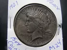 M-24, EF, SIVLER $1.00 1921-PEACE