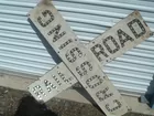 R.R.  SIGN W/GLASS REFLECTORS
