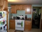 Kitchen Cupboards around stove.