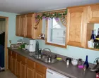 Left side view of base & upper kitchen cupboards!