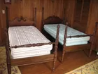 Twin beds with tobacco leaf carvings