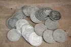 24 SILVER DOLLARS FOUND IN SOCK DRAWER
