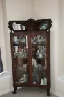 Antique Curio Cabinet w/ S shaped glass