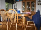 Oak dining table, 8 chairs & cabinet