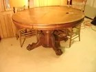 ROUND OAK TABLE-ORNATE BASE-CLAW FEET