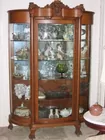 Fine Oak Bowfront with Lion Head Carvings