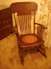 ANTIQUE OAK SPINDLE BACK ROCKER