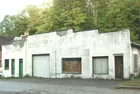GARAGE BLDG. - MIKE CHARNEGO AUCTIONEERS