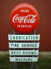 Coca-Cola curb sign