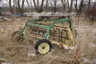 JD 660 dolly wheel rake