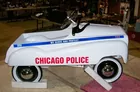 Lyn Liechty Auctions NIB Chicago Police Pedal Cars