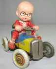 Rare Prewar Japan windup Boy on Car