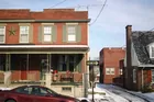 2 story Brick and Vinyl House
