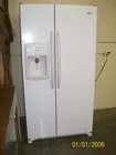 Maytag side by side frig & freezer