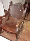 Carved Rocker With Lion Heads