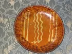 early decorated redware plate