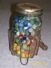 3 Jars marbles By Merritt Family Auctions