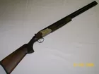 New Mossberg 20 ga. by Merritt Family Auctions