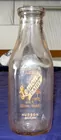 Lyn Liechty Auctions  Lemon's Milk Bottle