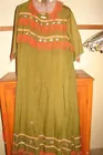old handmade fringed garment