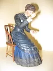 19th Century wood carved figure with chair