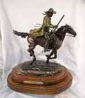 In Hot Pursuit Bronze by Bob Parks