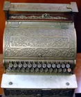 National Cash Register Brass