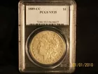 1889 CC - graded silver dollar-Merritt Auctions