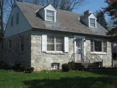 3.8 ac tract w/ stone house & pole barn