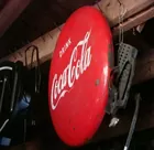 COKE BUTTON SIGN