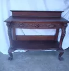 CARVED OAK SERVER W/LION HEADS