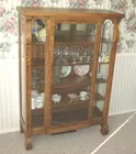 LYN LIECHTY AUCTIONS  Oak China Cabinet