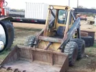 NEW HOLLAND 555 SKID STEER