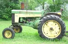 JD 630 1960 with factory wide front