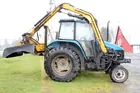 1999 New Holland TS100 Tractor w/ Boom Mower