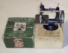 LYN LIECHTY AUCTIONS   Child's Sewing Machine 