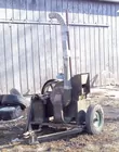 LYN LIECHTY AUCTIONS  Old Feed Grinder 