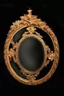 Fine Pair of Oval Gilt Mirrors