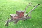 Antique 1 row corn planter, orig deco.