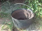 very large iron kettle