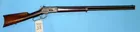 Winchester Model 1886 lever action rifle.