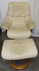 Stessless leather recliner and ottoman