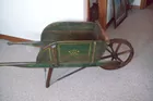 Todd Wills Auctioneering- Antique Wheel barrow