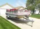 Liechty Auctions,  Hurricane Pontoon Boat