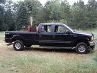2000 Ford F250 4 door truck with plow