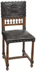 One of 12 Hand-Tooled Leather Chairs