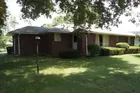 Brick Home On Lake Dr with Potential