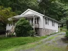 ONE-STORY FRAME 2-BEDROOM BUNGALOW
