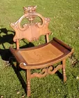 Moyer Auction-oak bench w/gargoyle back/cane seat