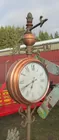 Weather-vane clock